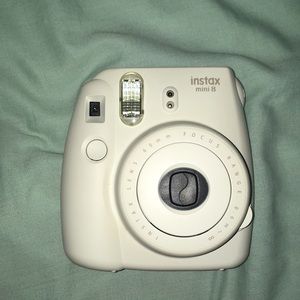 White Instax Mini 8 Polaroid camera